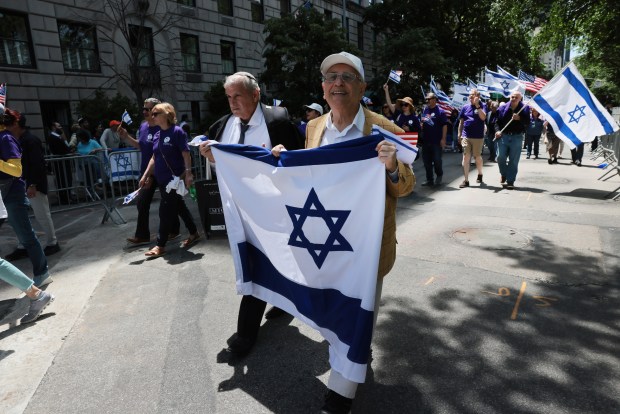 NEW YORK, NEW YORK - MAY 31: Thousands of Jewish and Israeli Americans participate in the annual Israeli Day Parade, the world's largest pro-Israel parade, on May 31, 2026, in New York City. This year's event takes place under heightened security with hundreds of police, K-9 units, and undercover officers patrolling the route up 5th Avenue. New York City mayor Zohran Mamdani did not attend the parade, the first mayor in recent history not to do so. (Photo by Spencer Platt/Getty Images)