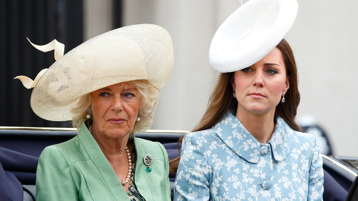 Camilla Duchess of Cornwall and Catherine Duchess of Cambridge riding in horse-drawn carriage