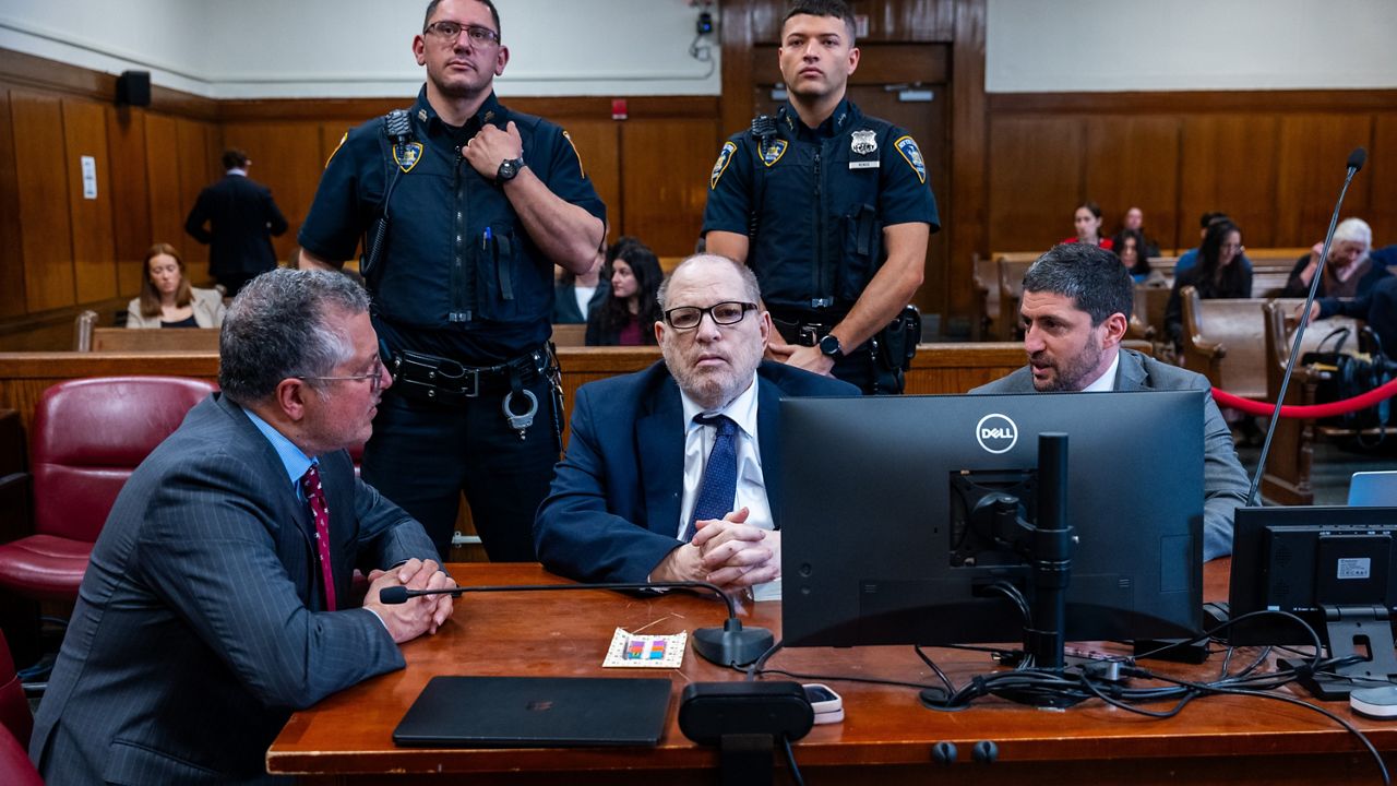 Harvey Weinstein appears with attorneys Marc Agnifilo, left, and Jacob Kaplan in Manhattan criminal court, Thursday, May 14, 2026, in New York. (Spencer Platt/Pool Photo via AP)