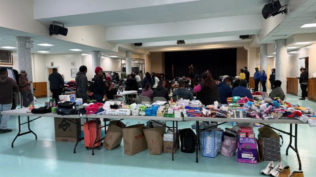 Basic necessary items, including food, clothes and hygiene products, are pictured at Our Lady of Mount Carmel Church at the corner of E. 187th St. and Belmont Ave. in the Bronx on April 22, 2026. (Sheetal Banchariya / New York Daily News)