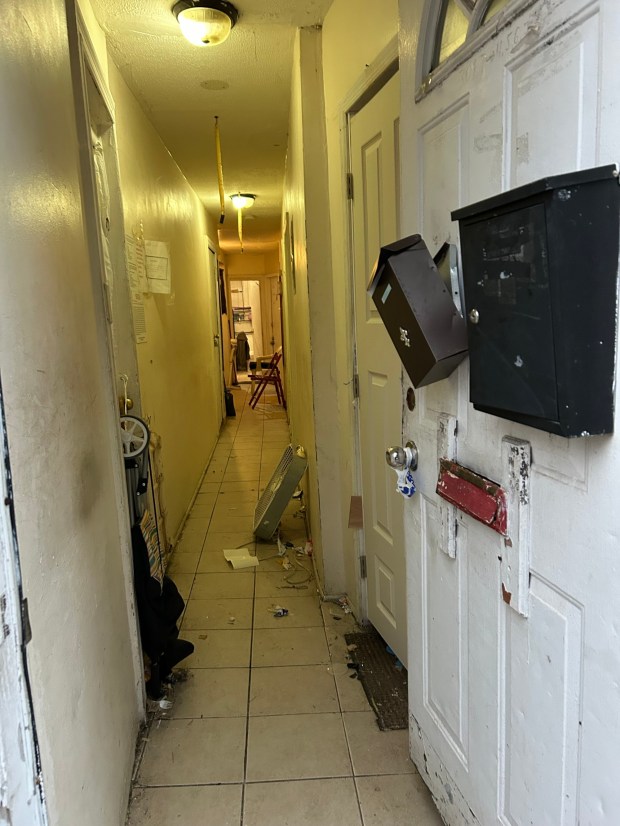An unidentified man was found dead in a single-room apartment buried under a heap of garbage in a house located on Brighton Seventh St. in Brooklyn on May 6, 2026. (Kerry Burke / New York Daily News)