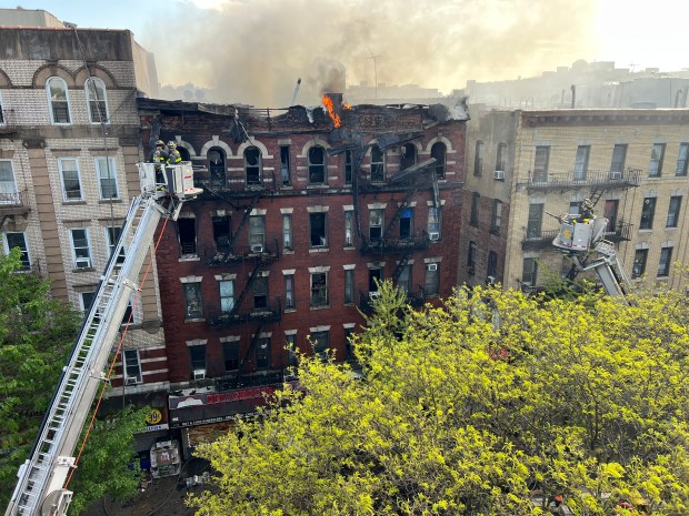 FDNY firefighters respond to a fire on E. 187th St. in the Bronx on Tuesday, April 21, 2026. (Barry Williams / New York Daily News)