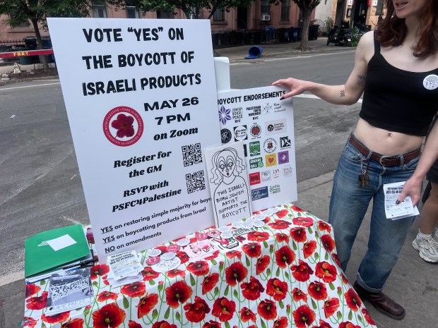 Canvassers from BDS and Coop 4 Unity hand out fliers at the Park Slope Food Coop on Friday, May 22, 2026.