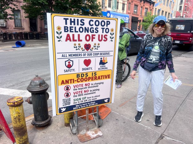 Canvassers from BDS and Coop 4 Unity hand out fliers at the Park Slope Food Coop on Friday, May 22, 2026.
