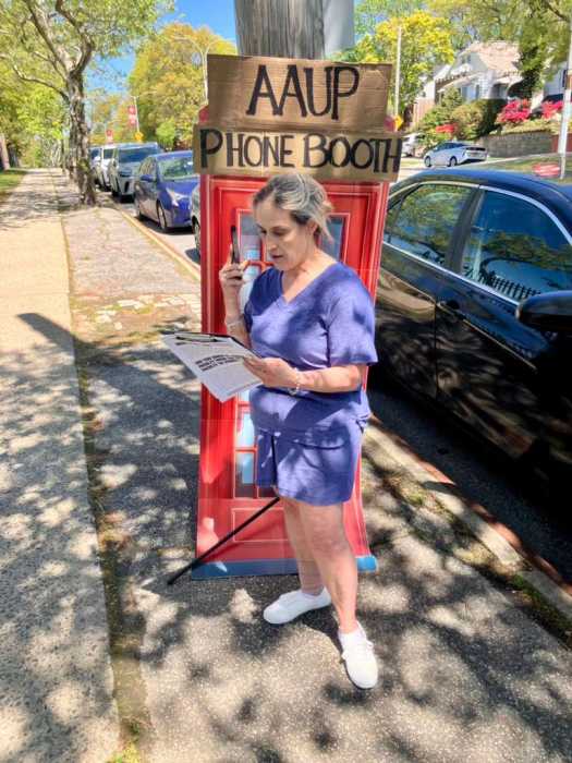 A makeshift phone booth at Friday's protest. Photo via SJU-AAUP.
