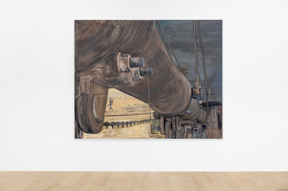 A large painting of industrial pipes and machinery frames a small scene of a figure walking across a pale landscape beneath a cloudy sky.