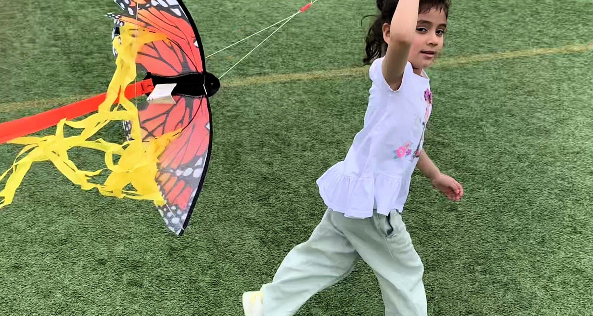 Kite fliers sprinted across Brooklyn Bridge Park’s Pier 5 with their colorful creations during 2024’s Spring Festival. Photo: Mary Frost, Brooklyn Eagle