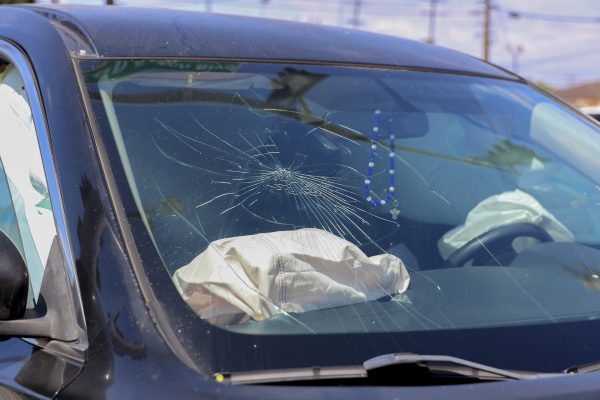 The damaged windshield of Jorge Garcia's black Nissan Rogue. His car was involved in a head-on collision at the intersection of Manhattan Beach Boulevard and Crenshaw Boulevard on Wednesday, May 27, with a white car. (Eleni Klostrakis| The Union)