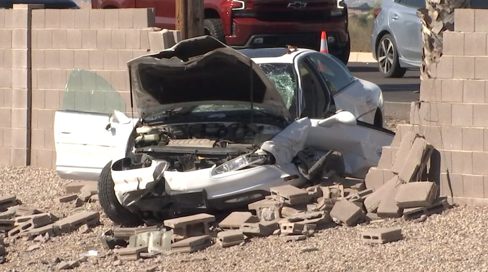 A man is dead after crashing into a wall in Queen Creek.