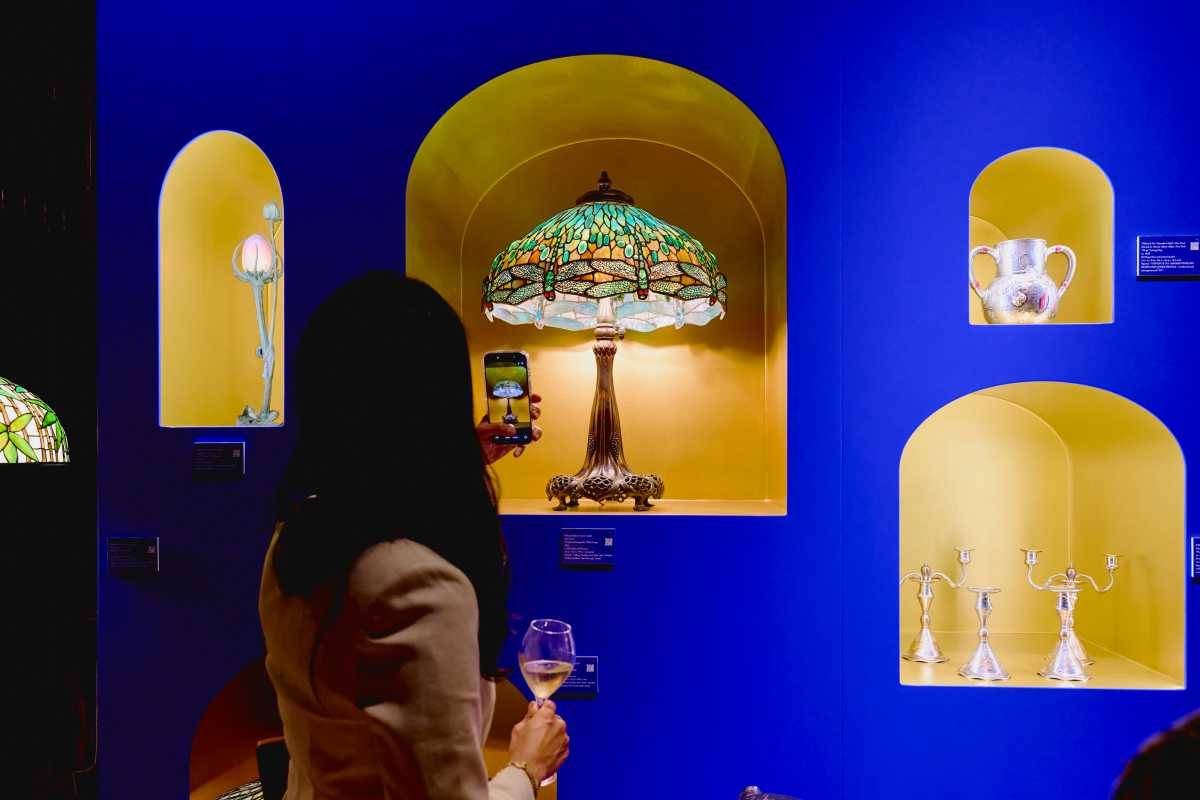 A spectator views art at TEFAF.