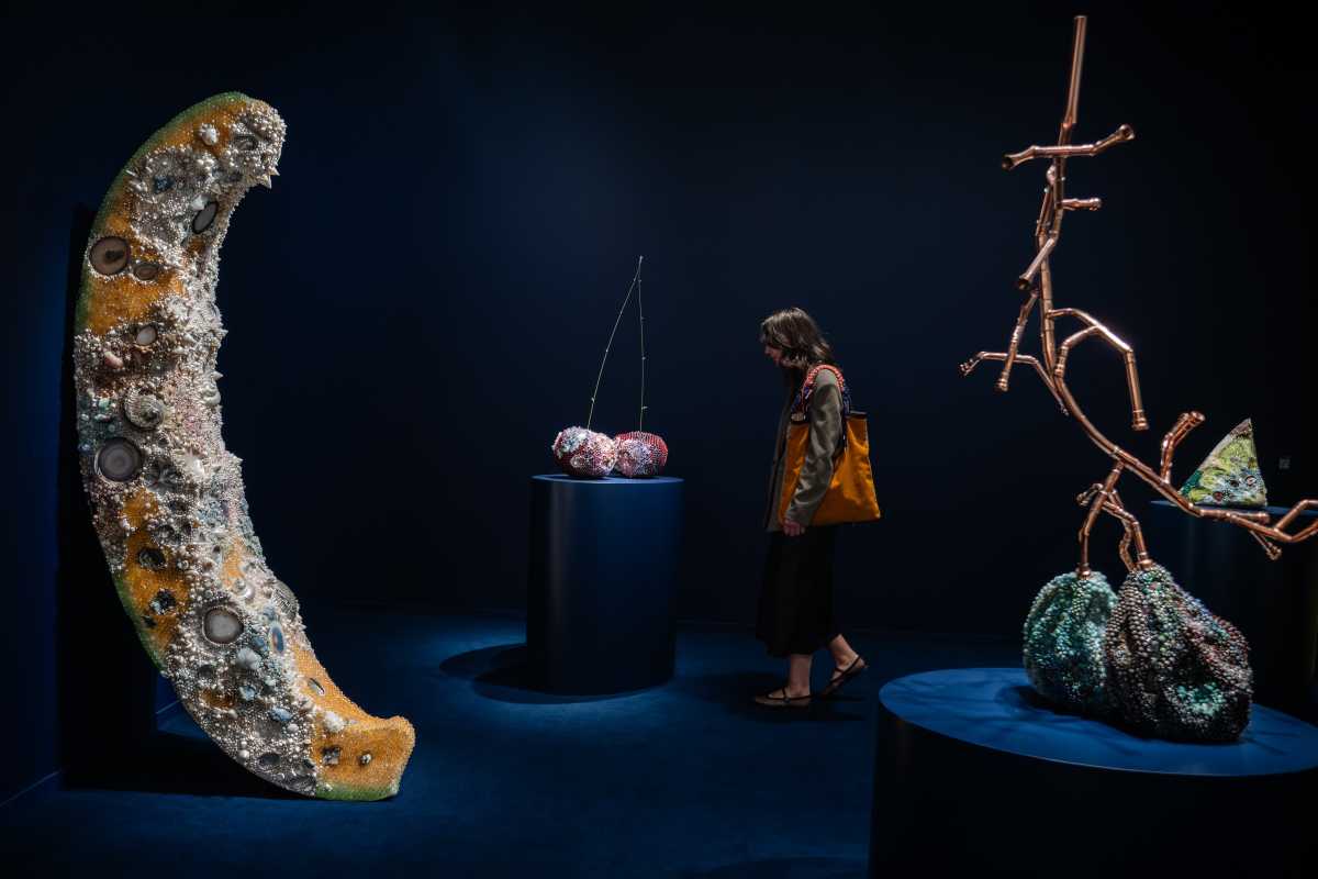 A spectator views art at TEFAF.