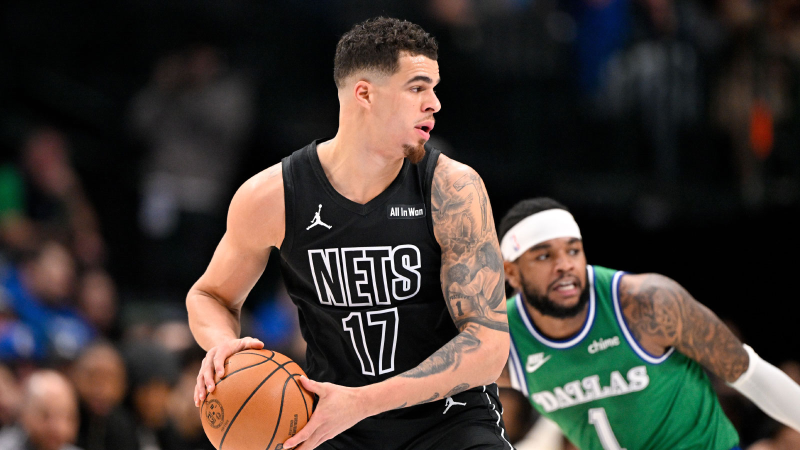 Brooklyn Nets forward Michael Porter Jr. (17) controls the ball in front of Dallas Mavericks guard Jaden Hardy (1) during the first quarter at the American Airlines Center.
