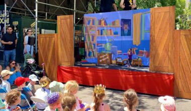 Kids watch entranced as puppeteers from the City Parks Foundation’s PuppetMobile put Pinocchio through his paces on Montague Street. Photo: Mary Frost/Brooklyn Eagle