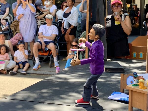 Pinocchio takes to the stage during Sunday’s Montague Open Streets activities. Photo: Mary Frost/Brooklyn Eagle