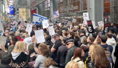 Protesters rally outside New York Times, demand Kristof firing over article