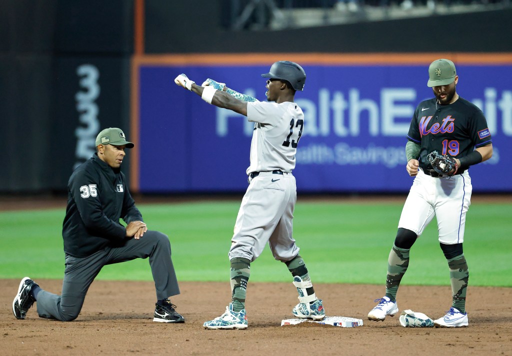 New York Yankees second baseman Jazz Chisholm Jr. (13) reacts after he hits a two-run double.