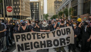 Protesters block an entrance to the Federal building on Broadway after a rally against ICE arrests at Foley Square in New York, on June 10, 2025.