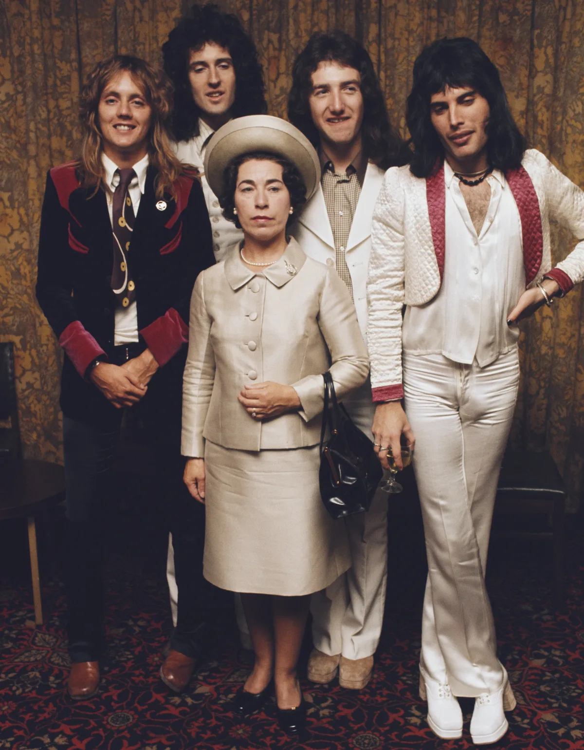 Queen posing with actress and Queen Elizabeth II look-alike, Jeannette Charles, September 1974