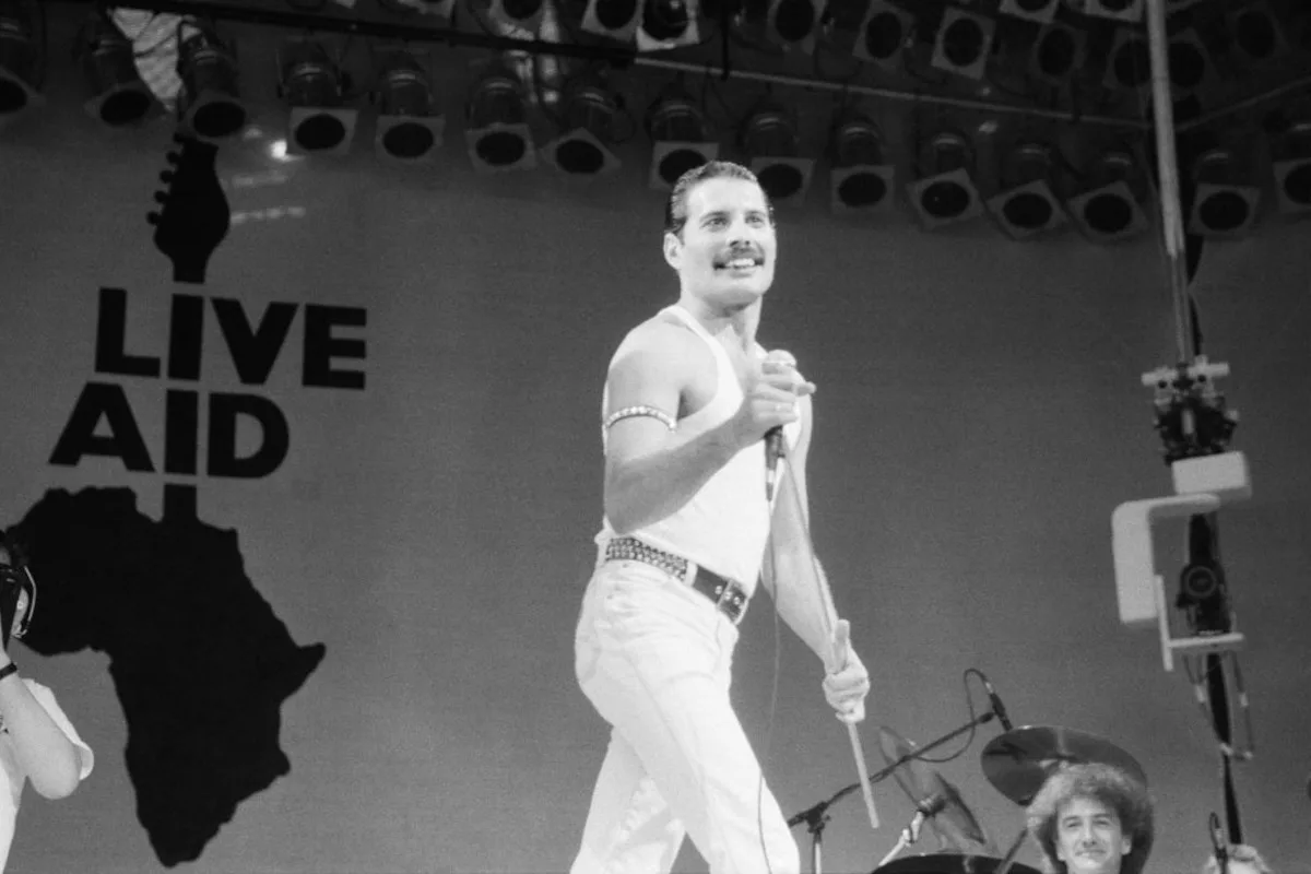 Freddie Mercury leads Queen in their storming Live Aid set, 1985