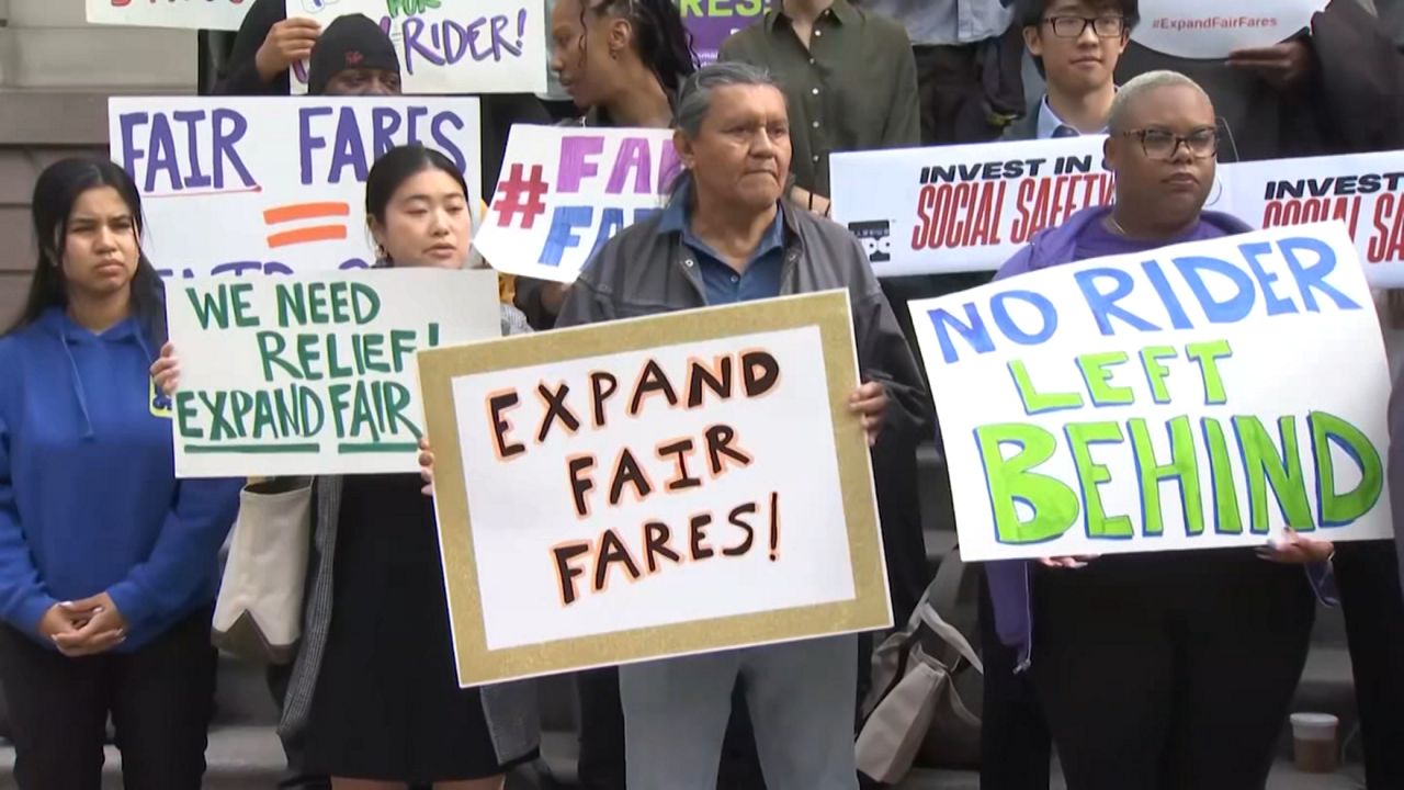 At the steps of City Hall, transit advocates rallied ahead of a hearing on the Fare Fairs program to push for expanded enrollment. (Spectrum News NY1)