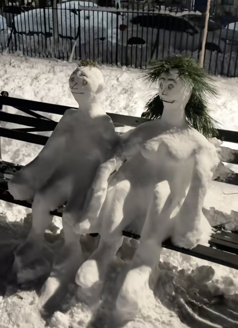 A Man Took A Stroll Through A Snowman Museum In Brooklyn snowmen in a park