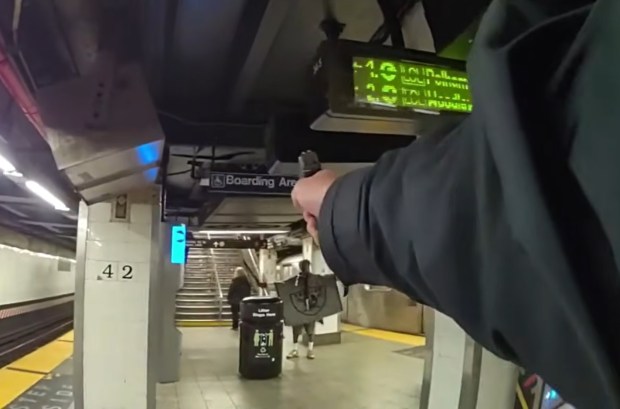 Anthony Griffin confronted NYPD Transit detectives Ryan Giuffre and Anthony Manetta while wielding a machete on the stairs leading from the mezzanine to the uptown 4/5/6 platform inside Grand Central Station around 9:40 a.m. on April 11, the newly released footage shows. (NYPD)