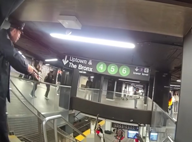 Anthony Griffin confronted NYPD Transit detectives Ryan Giuffre and Anthony Manetta while wielding a machete on the stairs leading from the mezzanine to the uptown 4/5/6 platform inside Grand Central Station around 9:40 a.m. on April 11, the newly released footage shows. (NYPD)
