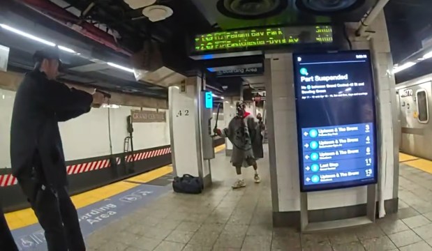 Anthony Griffin confronted NYPD Transit detectives Ryan Giuffre and Anthony Manetta while wielding a machete on the stairs leading from the mezzanine to the uptown 4/5/6 platform inside Grand Central Station around 9:40 a.m. on April 11, the newly released footage shows. (NYPD)