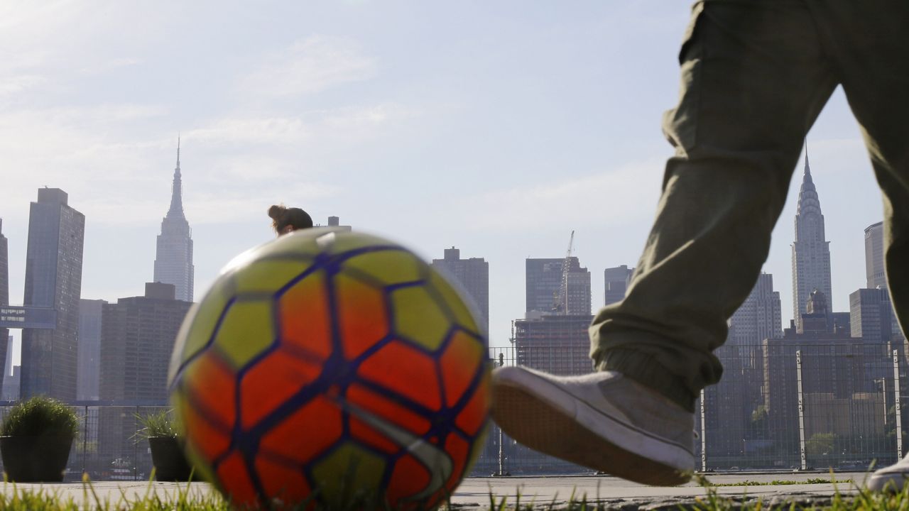 soccer ball with nyc skyline