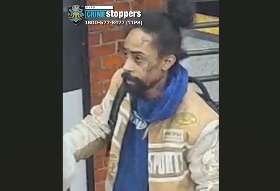 Cops release photos of tattoo-faced suspect in Times Square subway slashing