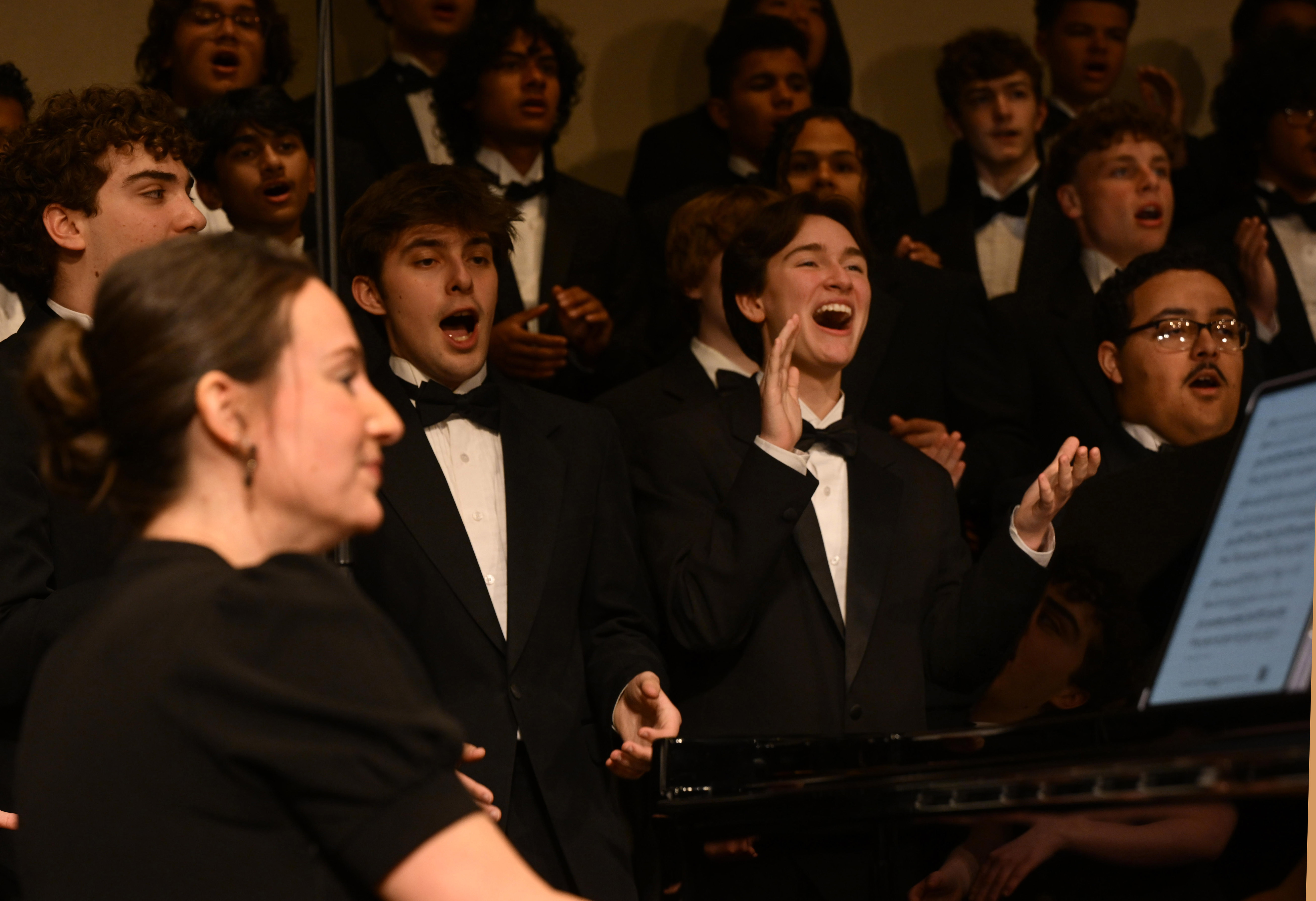 Cameron Dunham, a Liberty High School student claps his hands...