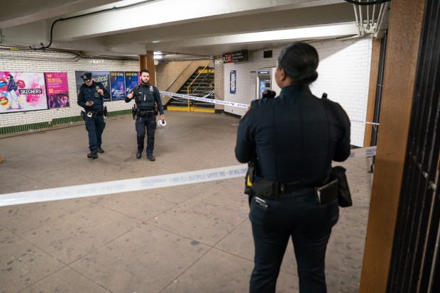 NYPD officers are pictured after a stabbing in the 145th Street subway station on the A/B/C/D line Friday, May 8, 2026 in Manhattan, New York. (Barry Williams/ New York Daily News)