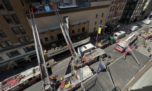 Firefighters respond to a fire at the Eugene O'Neill Theater on W. 49th St. in Manhattan on Monday. (Barry Williams / New York Daily News)
