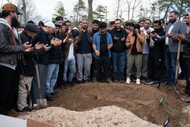 Mourners pray over Abdul Saleh's grave in Marlboro Muslim Cemetery Thursday, April 30, 2026 in Morganville, New Jersey. (Barry Williams/ New York Daily News)