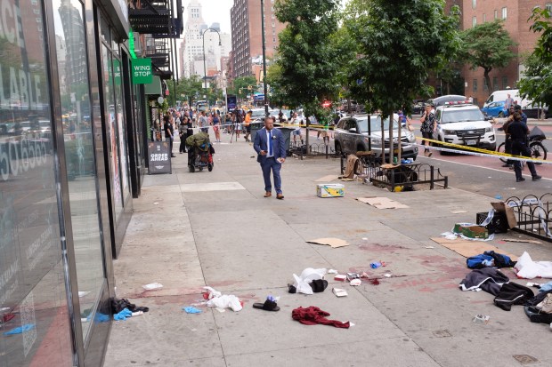 Police investigate stabbings on E. 14th St. near Avenue A in Manhattan, New York on Sunday, June 23 2024. (Gardiner Anderson for New York Daily News)