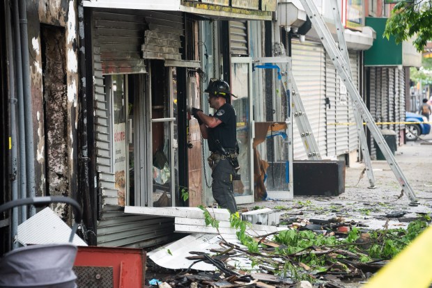 Firefighters respond to a fatal fire on 3rd Ave. near E. 140th St. in the Bronx on Wednesday, May 6, 2026. (Gardiner Anderson / New York Daily News)