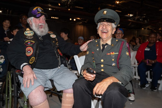 U.S. veterans share stories before the annual Memorial Day commemoration ceremony at the Intrepid Museum Monday, May 25, 2026 in Manhattan, New York. (Barry Williams/ New York Daily News)