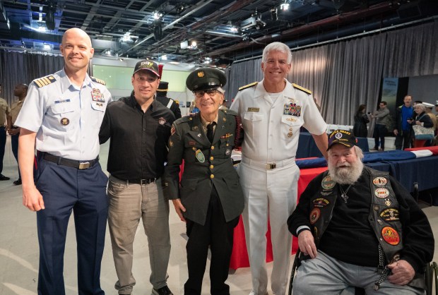 Admiral Karl Thomas, Commander United States Fleet Forces Command, poses with veterans during the annual Memorial Day commemoration ceremony at the Intrepid Museum Monday, May 25, 2026 in Manhattan, New York. (Barry Williams/ New York Daily News)