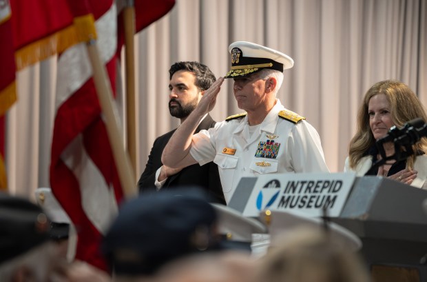 Admiral Karl Thomas, Commander United States Fleet Forces Command, salutes the U.S. flag at the Intrepid Museum during the annual Memorial Day commemoration ceremony Monday, May 25, 2026 in Manhattan, New York. (Barry Williams/ New York Daily News)