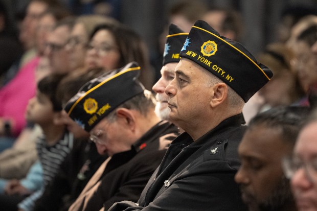 Veterans listen during the annual Memorial Day commemoration ceremony at the Intrepid Museum Monday, May 25, 2026 in Manhattan, New York. (Barry Williams/ New York Daily News)