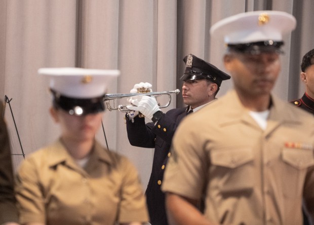A bugle player performs Taps during the annual Memorial Day commemoration ceremony at the Intrepid Museum Monday, May 25, 2026 in Manhattan, New York. (Barry Williams/ New York Daily News)