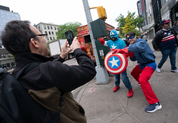 Marvel Comic characters pose with City Council Member Christopher Marie after a street renaming for Jack Kirby Way at Essex St. and Delancey St. Monday, May 11, 2026 in Manhattan, New York. (Barry Williams/ New York Daily News)