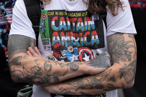 A Jack Kirby fan waits for a street renaming for Jack Kirby Way to start at Essex St. and Delancey St. Monday, May 11, 2026 in Manhattan, New York. (Barry Williams/ New York Daily News)