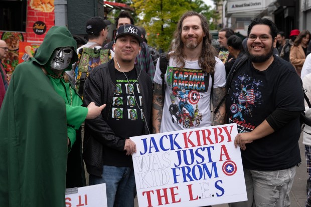 Marvel Comic fans pose for a photo before a street renaming for Jack Kirby Way at Essex St. and Delancey St. Monday, May 11, 2026 in Manhattan, New York. (Barry Williams/ New York Daily News)