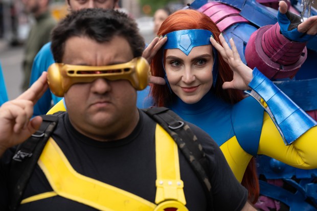 Fans dressed as Marvel Comic characters pose for fellow fans after a street renaming for Jack Kirby Way at Essex St. and Delancey St. Monday, May 11, 2026 in Manhattan, New York. (Barry Williams/ New York Daily News)