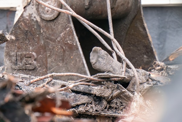 A body is pictured after a massive explosion on 130th St. in Queens on Thursday, April 30, 2026. (Theodore Parisienne / New York Daily News)