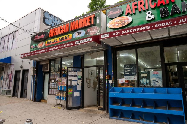 An 18-year-old man was taken to Saint Barnabas Hospital after he was shot in the abdomen near this location on Webster Ave. in the Bronx on Thursday, May 21, 2026. An FDNY ambulance, which was parked a short distance away, sustained gunshot damage to the front and rear windshields. (Theodore Parisienne / New York Daily News)
