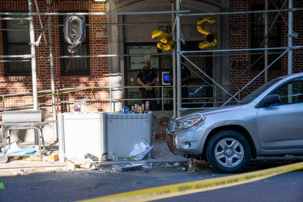 Police investigate after one person was shot in the hand and eight people were arrested after more than a dozen shots were fired outside an apartment building on Ralph Ave. near East New York Ave. in Brownsville, Brooklyn, early Saturday, May 30, 2026. (Theodore Parisienne / New York Daily News)