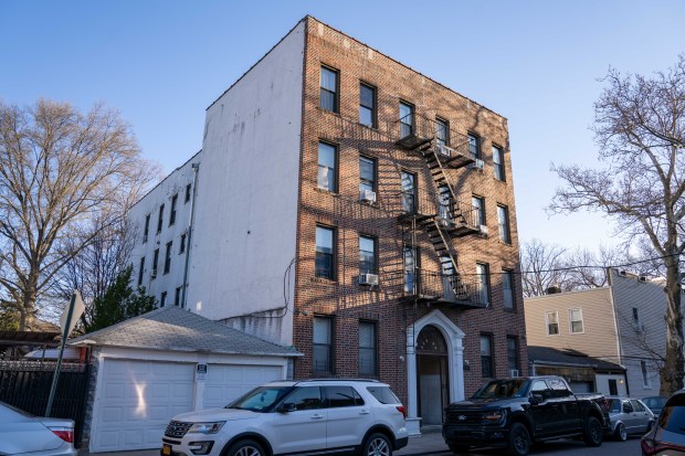 A 41-year-old man was stabbed to death and a woman slashed inside a Queens apartment building on 86th Ave. near 101st St. in Richmond Hill early Sunday, April 12, 2026. (Theodore Parisienne / New York Daily News)