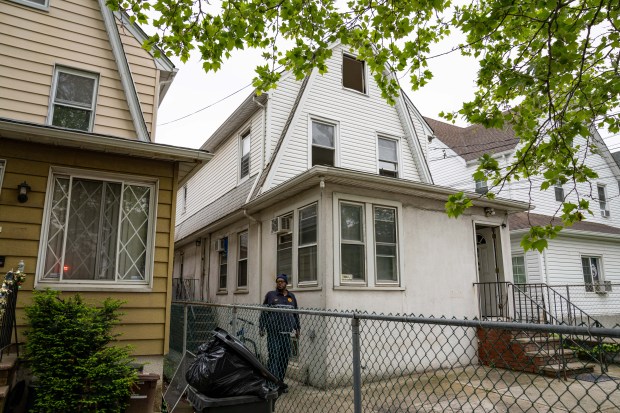 A man was pronounced dead on scene after a fire broke out inside a residence at 94-44 Lefferts Boulevard in Queens on Thursday May 7, 2026. 0739. (Theodore Parisienne / New York Daily News)